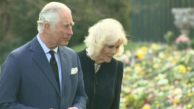 Prince Charles and his wife Camilla visit the garden of Marlborough House in London where the public has left flowers and notes in tribute to Prince Philip after he died on April 9 aged 99. Philip would have turned 100 in June. He was married to the Queen