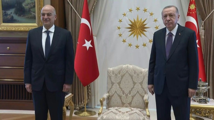 Turkish President Recep Tayyip Erdogan receives Greek Foreign Minister Nikos Dendias in Ankara for talks focused on the two NATO members' dispute over eastern Mediterranean borders and energy exploration rights.