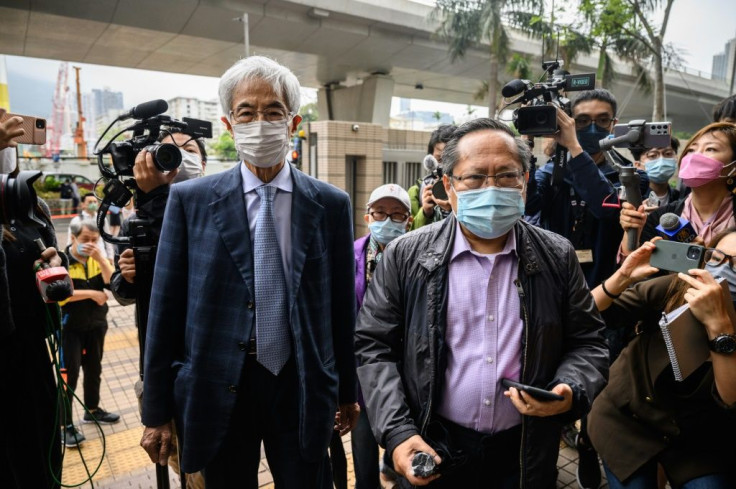 Former lawmakers Martin Lee (L) and Albert Ho  arrive at West Kowloon court in Hong Kong to receive sentencing after being found guilty of organising an unauthorised assembly in 2019