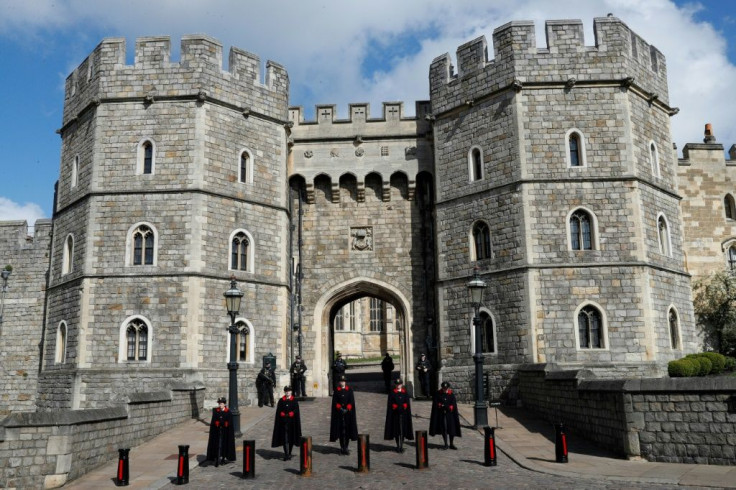Police patrolled the Long Walk outside the stately walls of Windsor Castle, where the funeral will be held on Saturday
