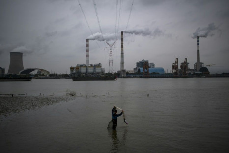 The Wujing Coal-Electricity Power Station in Shanghai. Each year China and America spew out more than half of the greenhouse gases linked to global warming