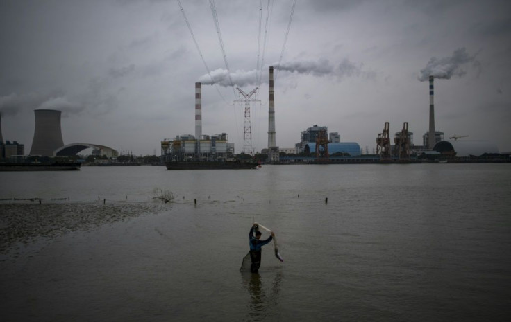 The Wujing Coal-Electricity Power Station in Shanghai. Each year China and America spew out more than half of the greenhouse gases linked to global warming