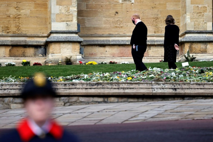 People have laid floral tributes at the entrance to Windsor Castle