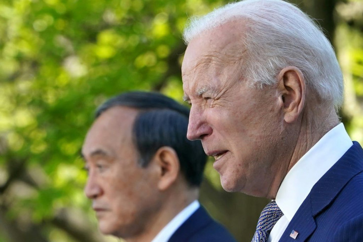 US President Joe Biden and Japan's Prime Minister Yoshihide Suga take part in a joint press conference in the Rose Garden of the White House