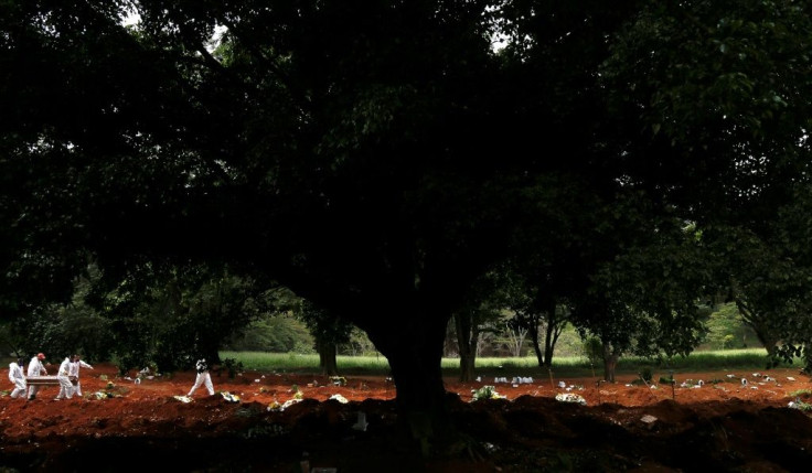 A burial at dusk at Sao Paulo's giant Vila Formosa cemetery: in March, it peaked at 105 burials in a single day, three times the pre-pandemic average