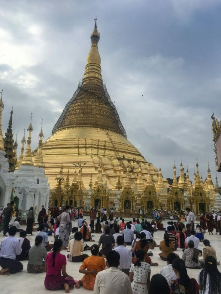 Hundreds in Yangon visited the famed Shwedagon Pagoda to pray for the Buddhist New Year