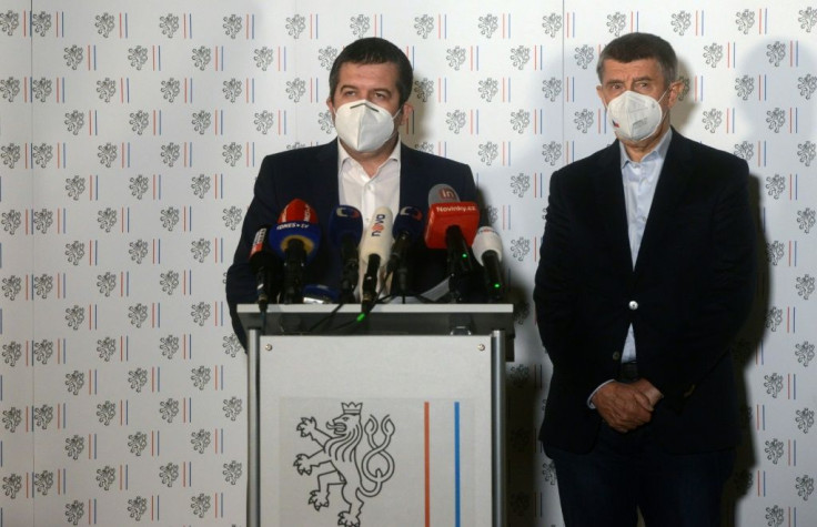 Czech Prime Minister Andrej Babis (R) and Czech Foreign Minister and Interior Minister Jan Hamacek wear face masks at a press conference in Prague where it was announced that the Czech Republic will expel 18 Russian diplomats who were involved in the case