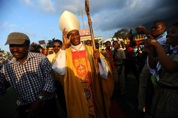 Haitian Cardinal Chibly Langlois leaves a Port-au-Prince stadium after presiding over a Mass on March 9, 2014