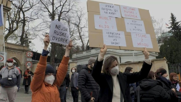 Czechs gather outside the Russian embassy in Prague to protest, angry over Russia's alleged involvement in a 2014 explosion in the east of the country. The government said Saturday it would expel 18 Russian diplomats seen as secret agents in retaliation,