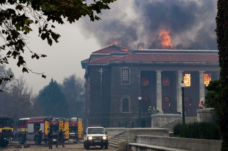 Firefighters try, in vain, to extinguish a blaze in the Jagger Library at the University of Cape Town