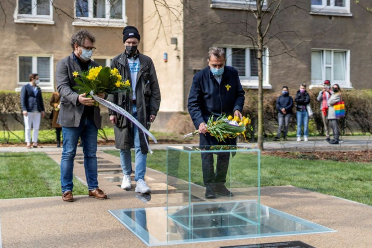 The memorial stands on ground now surrounded by Soviet-era buildings where the trove of documents about life and death in the Warsaw Ghetto was buried in total secret in 1942