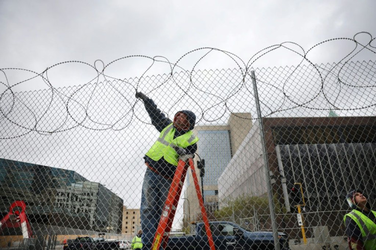 Workers fortify government buildings in downtown Minneapolis, Minnesota