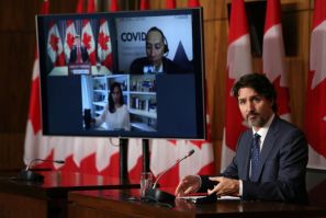 Canadian Prime Minister Justin Trudeau has said he doesn't want to trigger an election during a surge in new Covid-19 cases, and has won support for his budget from a smaller leftist party