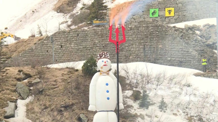 The traditional winter man known as the "Böögg" is set on fire in the heart of the Swiss mountains, near the St Gotthard Pass.