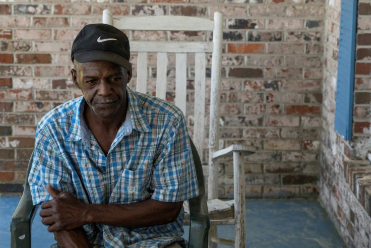 Darrell Wayne Moss, 59, a construction worker, speaks to AFP at his mother's house across the street from the Olin chemical plant in McIntosh, Alabama
