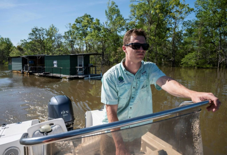 Cade Kistler, program director for Mobile Baykeeper environmental group, on the Tombigbee River, which has been exposed to pollution from two chemical plants