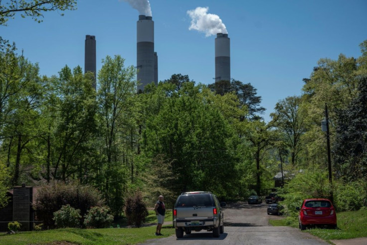 The smokestacks from the Miller power plant in Alabama tower over a residential neighborhood