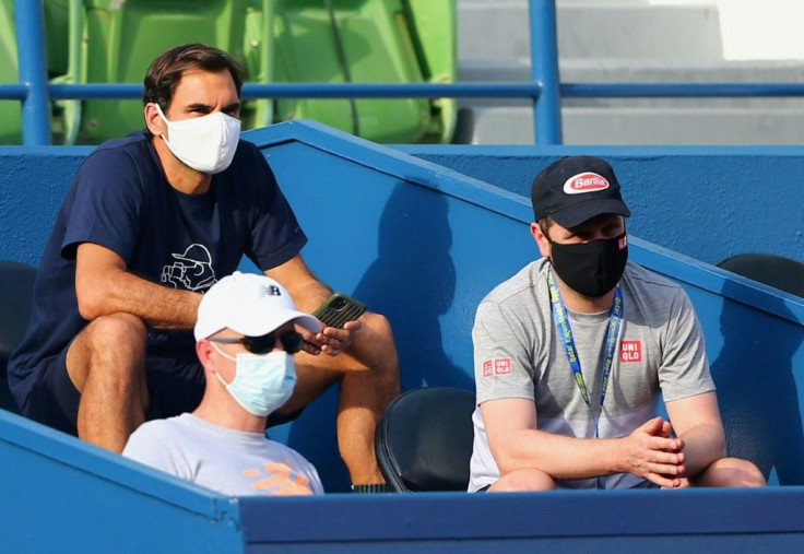 Roger Federer (L) during the Qatar ExxonMobil Open at the Khalifa International Tennis and Squash Complex in Qatari capital Doha in March 2021