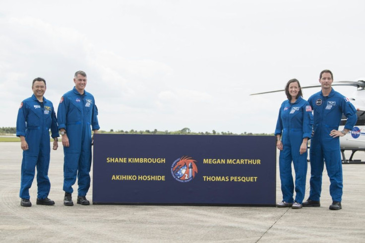 In this image released by NASA, (L-R) Japan Aerospace Exploration Agency astronaut Akihiko Hoshide, NASA astronaut Shane Kimbrough, NASA astronaut Megan McArthur and European Space Agency astronaut Thomas Pesquet pose for a photo