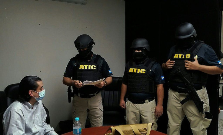 Forces from Honduras' Technical Criminal Investigation Agency detain Marco Antonio Bogran, the former director of Strategic Investments of Honduras, in April 2021 over allegations of irregular purchases of mobile hospitals
