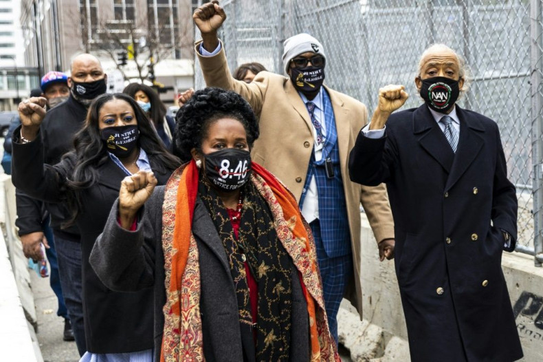 Members of George Floyd's family and Reverend Al Sharpton (R) were among many who gathered at the courthouse in Minneapolis, Minnesota for the trial of the white former police officer Derek Chauvin who was ultimately convicted of murdering Floyd