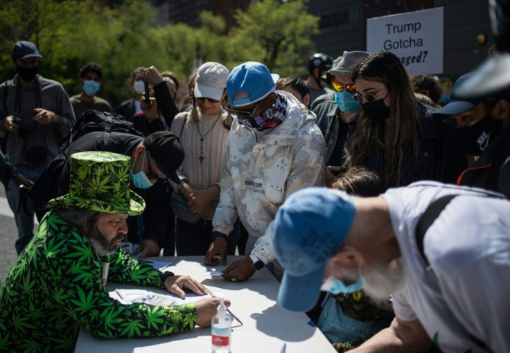 Marijuana activists hand out free joints to vaccinated New Yorkers on April 20, 2021 in New York City