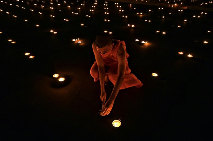 Monks chanted and 330,000 candles were burnt