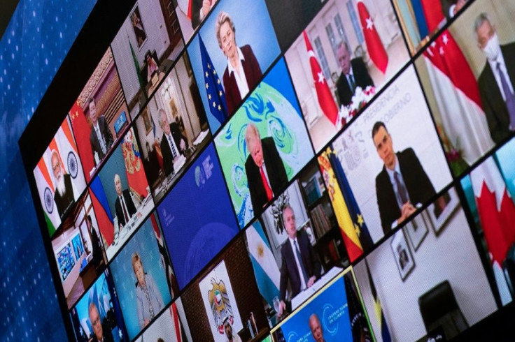 Russian President Vladimir Putin, Chinese President Xi Jinping, Turkish President Recep Tayyip Erdogan, British Prime Minister Boris Johnson, US President Joe Biden and others are seen on a screen during a climate change virtual summit at the White House