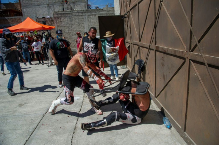 Wrestlers hit each other with chairs and even tube lights in the extreme version of 'lucha libre' -- Mexico's wildly popular mix of sport and entertainment