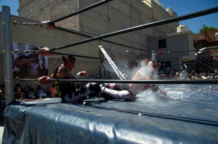The wrestlers know that stepping into the ring is even more dangerous due to Covid-19, but say they have no choice