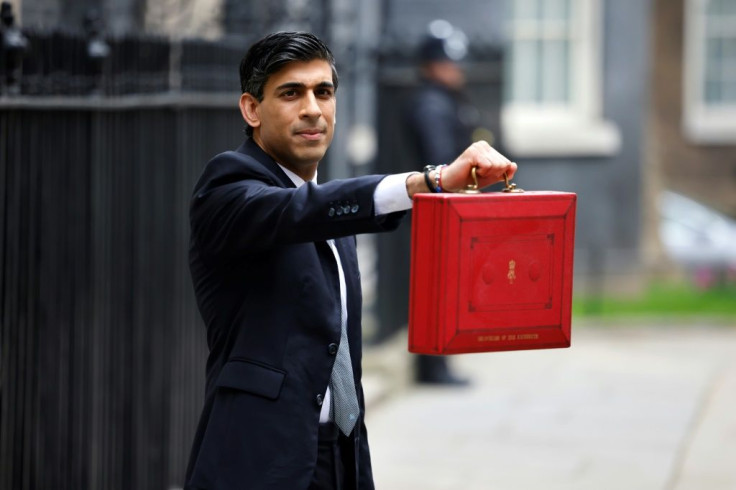 British finance minister Rishi Sunak showing the Budget Box last month. The statistics office says the pandemic had a "substantial impact" on the economy and public debt.