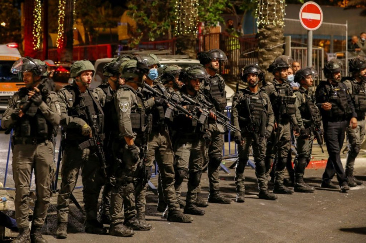 Members of the Israeli security forces deploy during clashes with Palestinian protesters outside the Damascus Gate in Jerusalem's Old City on April 22, 2021