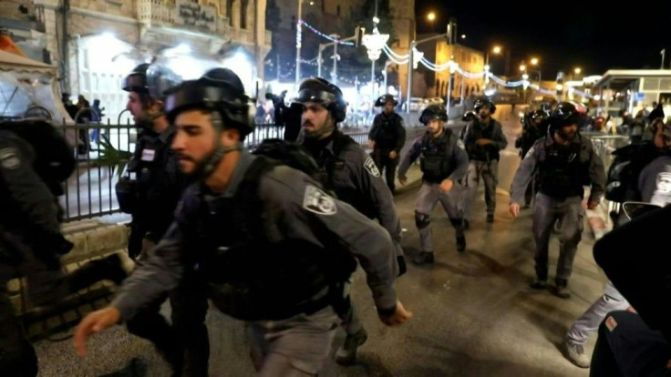 Palestinian protesters clash with Israeli security forces in annexed east Jerusalem, near the Old City, where police had barred access to some areas where Palestinians usually gather in large numbers during the holy Muslim fasting month of Ramadan.