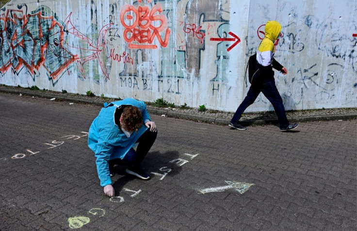 Germans are set to go into a tough new lockdown, including night curfews and school closures, after the government passed a disputed new law designed to slow infections