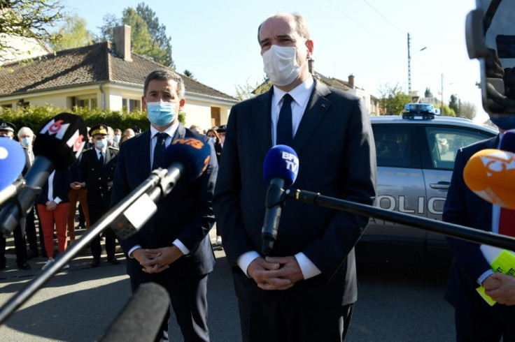 French Prime Minister Jean Castex, right, with Interior Minister Gerald Darmanin outside the Rambouillet station on Friday.
