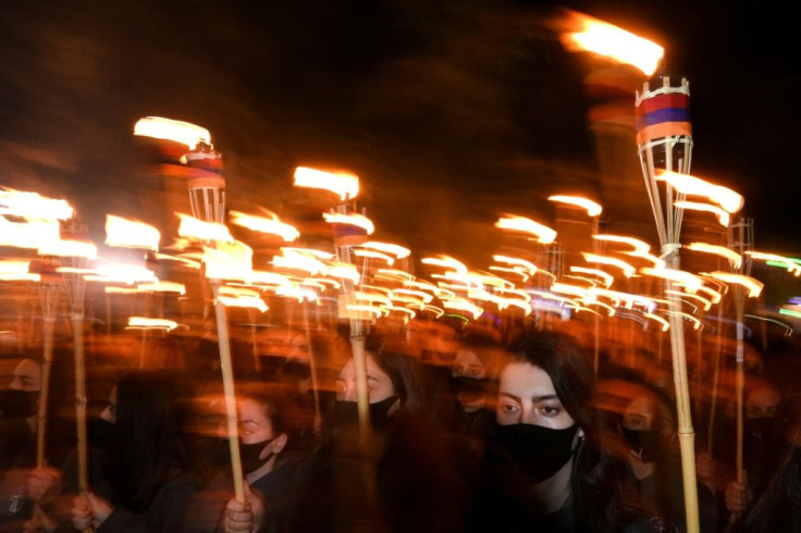 Armenians joined a torchlight procession to mark the 106th anniversary of the mass killings