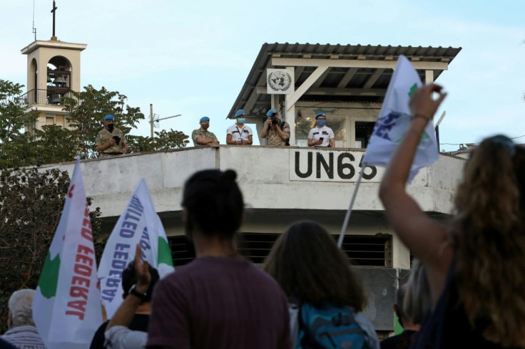 United Nations peacekeepers watched the rallies on Saturday; Cyprus has been divided since 1974