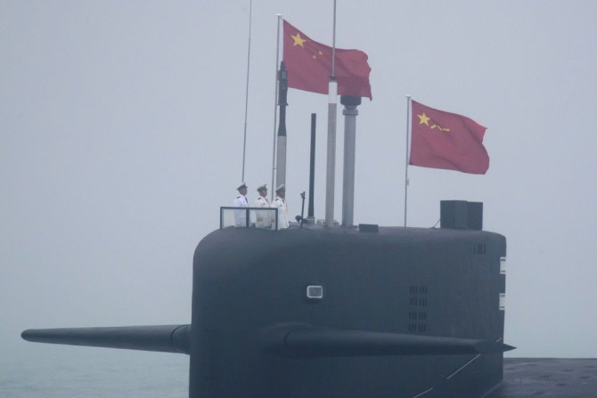 China's military spending has risen in tandem with its growing economy and has seen an increase for 26 consecutive years, reaching an estimated $252 billion in 2020 (pictured: a 094A Jin-class nuclear submarine Long March 10)