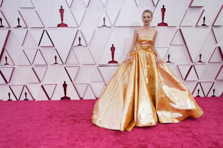 Oscar-nominated actress Carey Mulligan is ready for her big moment, dazzling on the red carpet in a golden gown