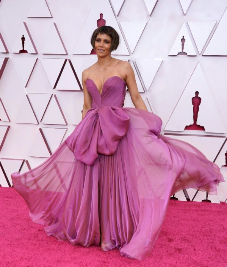 Actress Halle Berry rocked a new haircut and was pretty in purple at the Oscars