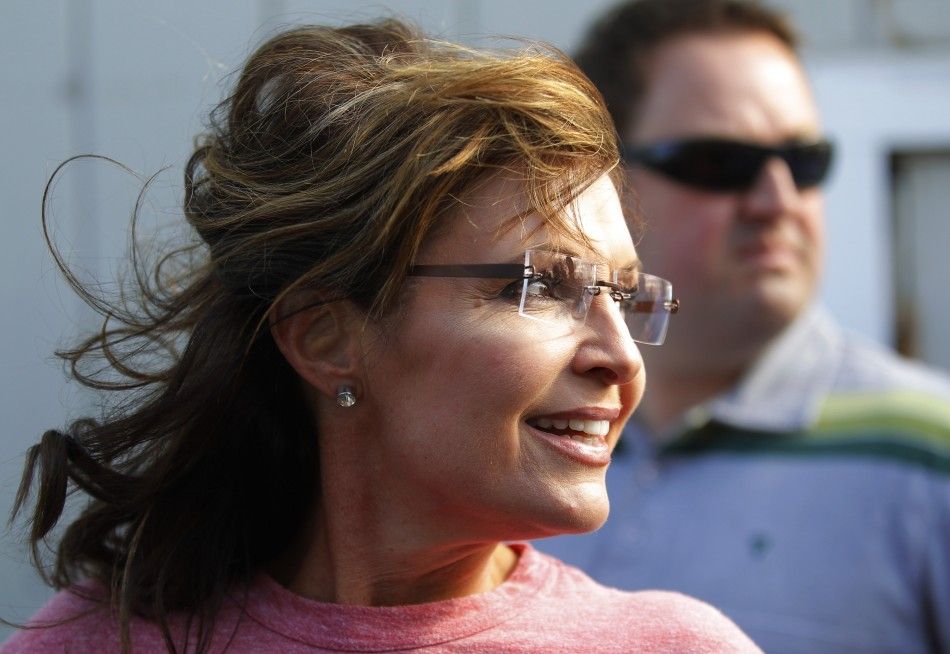 Former Alaska governor Palin looks back at a reporter during her visit to Yankee Seafood Cooperative in Seabrook
