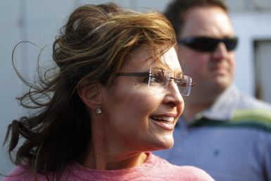 Former Alaska governor Palin looks back at a reporter during her visit to Yankee Seafood Cooperative in Seabrook