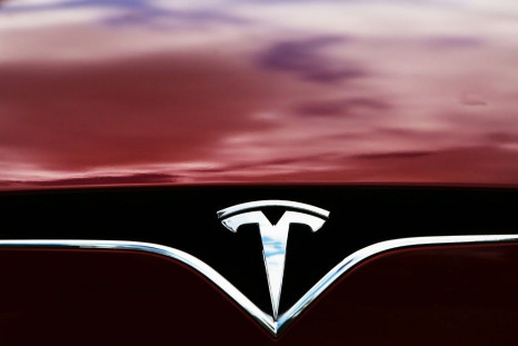 Tesla reported higher profits and said expansion projects are on track