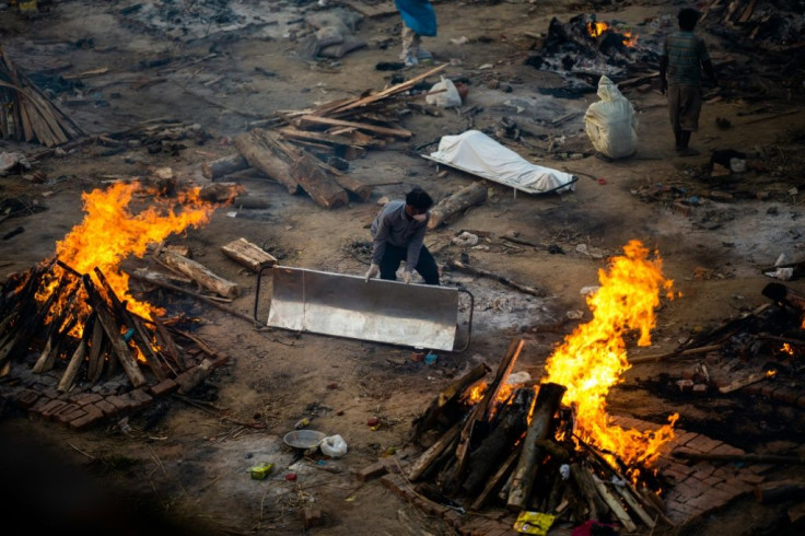 India reported 352,991 new infections and 2,812 deaths on Monday, the latest in a series of daily records