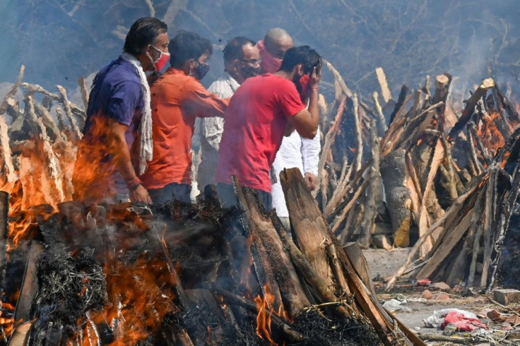 The explosion in infections in India -- 350,000 new cases were recorded there on Tuesday alone -- has driven a surge in global cases