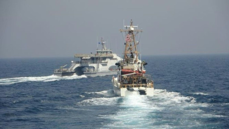 A handout photo courtesy of the US Navy shows an earlier incident in which an Iranian navy ship conducted an unsafe and unprofessional action by crossing the bow of a US Coast Guard patrol boat in the Gulf on April 2, 2021