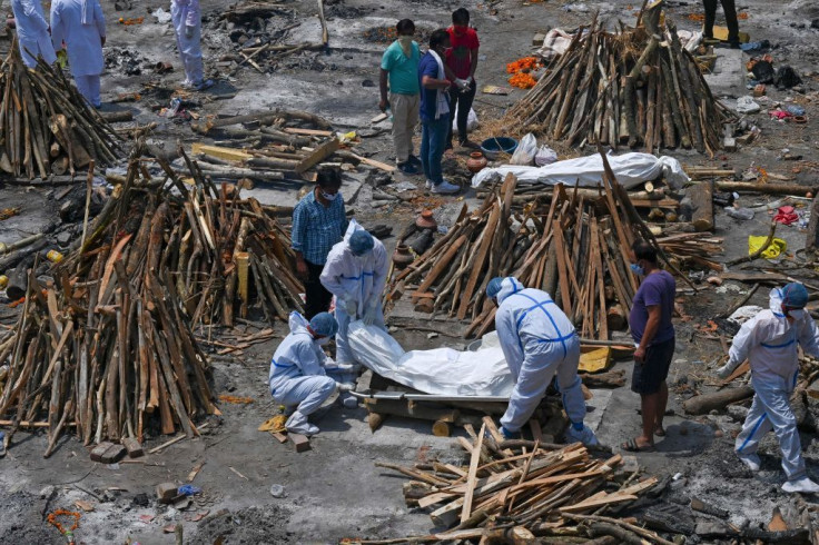 Families are building funeral pyres for deceased COVID-19 patients in India
