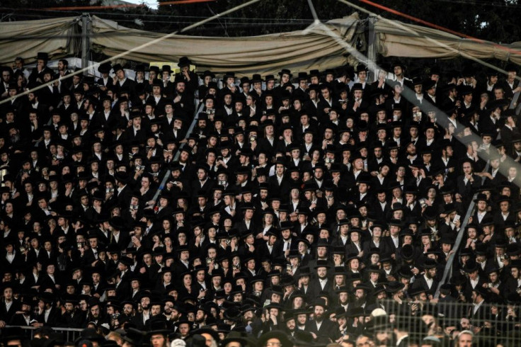 Ultra-Orthodox Jews gather at the grave site of Rabbi Shimon Bar Yochai at Mount Meron in northern Israel on April 29, 2021 as they celebrate the Jewish holiday of Lag BaOmer