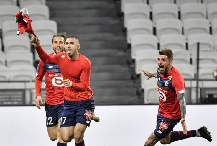 Burak Yilmaz (C) scored twice in the 3-2 win over Lyon as Lille recovered from two goals down