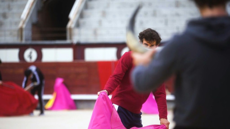 The chants of "Toro! Toro!" resonate even louder in the empty arenas of Las Ventas in Madrid, the world's most prestigious bullfighting arena, where Alvaro and Guillermo are training. The two young apprentice matadors have seen their budding careers come
